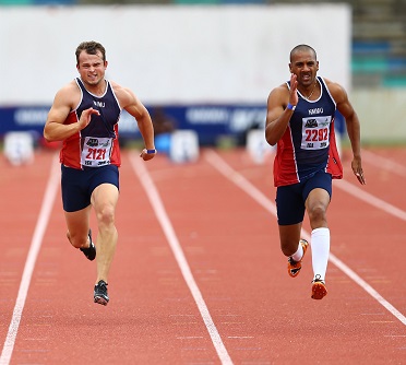 Former Olympic athlete Sergio Mullins (right) made a convincing comeback by winning the 100m for men at the NMMU Stadium in Port Elizabeth on Saturday. Photo: Full Stop Communications/Richard Huggard